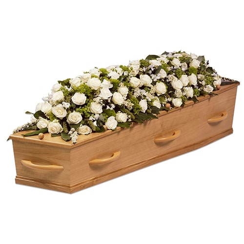 Casket decoration of white roses