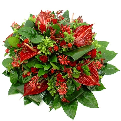Funeral arrangement of red flowers