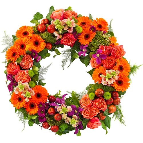 Funeral wreath ajour orange and fuchsia