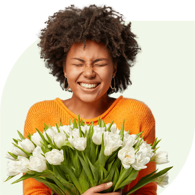 Woman happy with white flowers